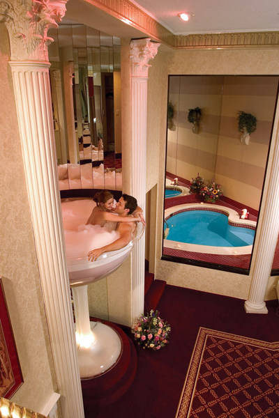 You could spend your Honeymoon in a 7-foot Champagne Glass Bath … or Not.