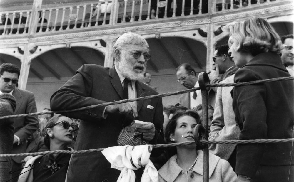 EH8751P ca. 1959 Ernest Hemingway signing an autograph at a bullfight in Aranjuez, Spain Spain, 1953-1960: Box 23 Folder 17 Please credit: "Unknown. Ernest Hemingway Photograph Collection. John F. Kennedy Presidental Library and Museum, Boston"