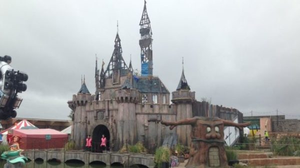 Banksy’s Twisted Version of Disneyland Opens this Weekend