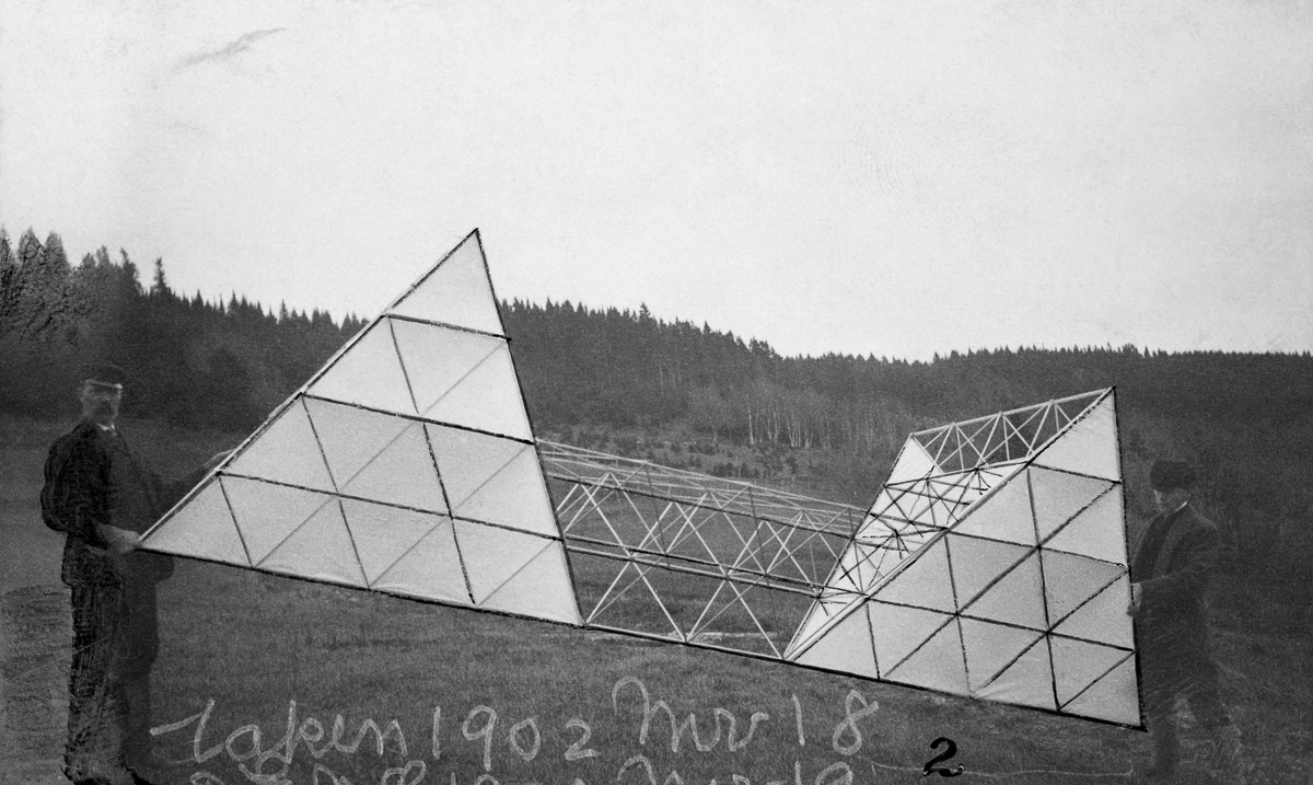 Cape Breton Island, Nova Scotia, Canada --- Men hold up Alexander Graham Bell's multicelled tetrahedral kite. --- Image by © Bell Collection/National Geographic Creative/Corbis
