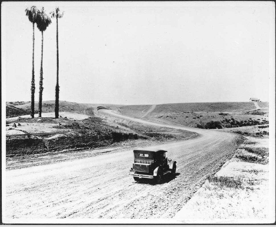automobile_driving_down_sunset_boulevard_during_the_roads_construction_ca1925