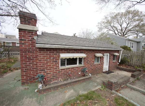 The exterior of the Brick Midget House in Brick